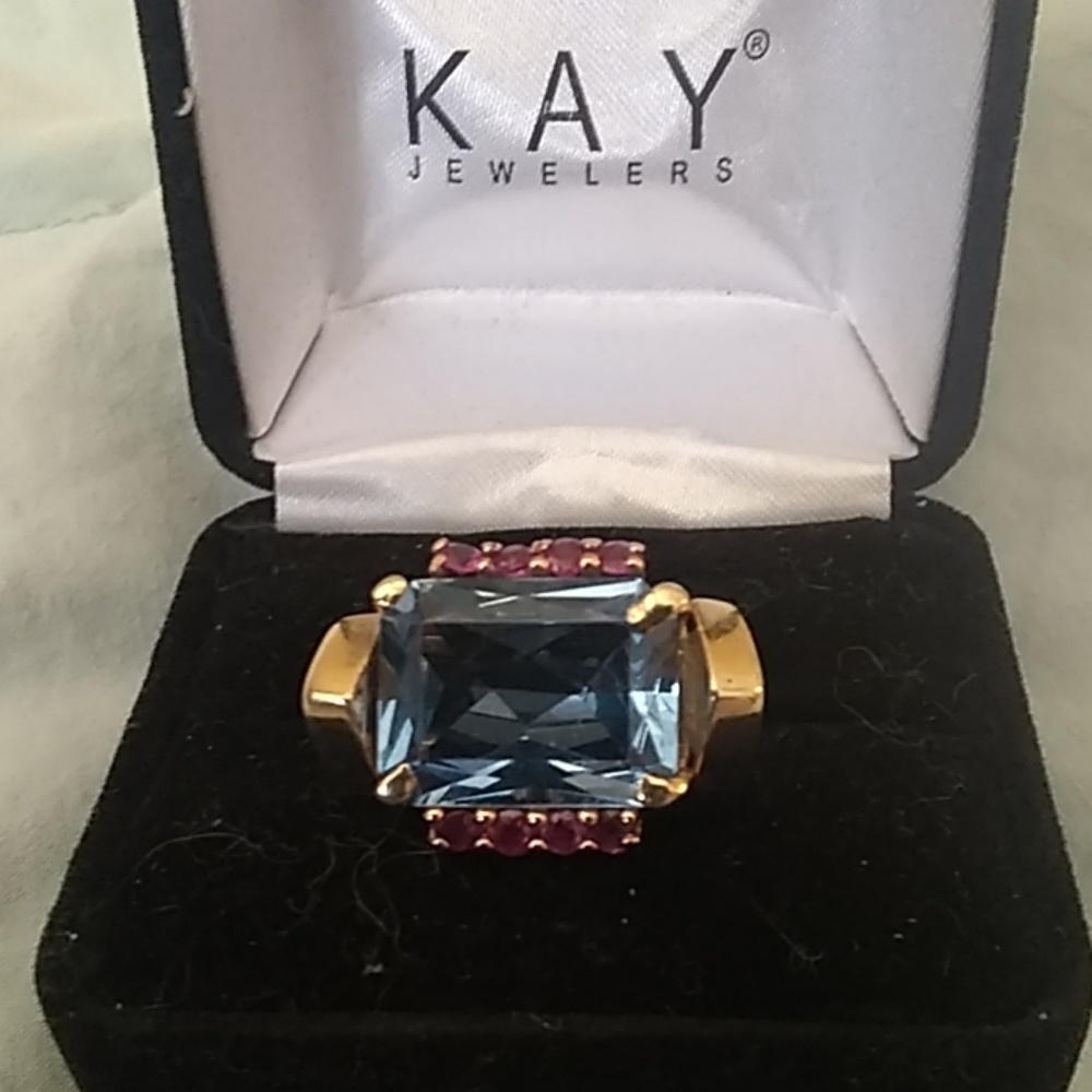 Ruby and blue topaz ring.14 kt.
